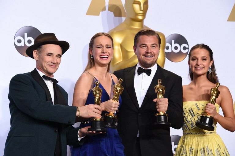 Best Supporting Actor Mark Rylance, Best Actress Brie Larson, Best Actor Leonardo DiCaprio and Best Supporting Actress Alicia Vikander pose with their Oscar in the press room during the 88th Oscars in Hollywood on February 28, 2016 (Credit: Robyn Beck / AFP)